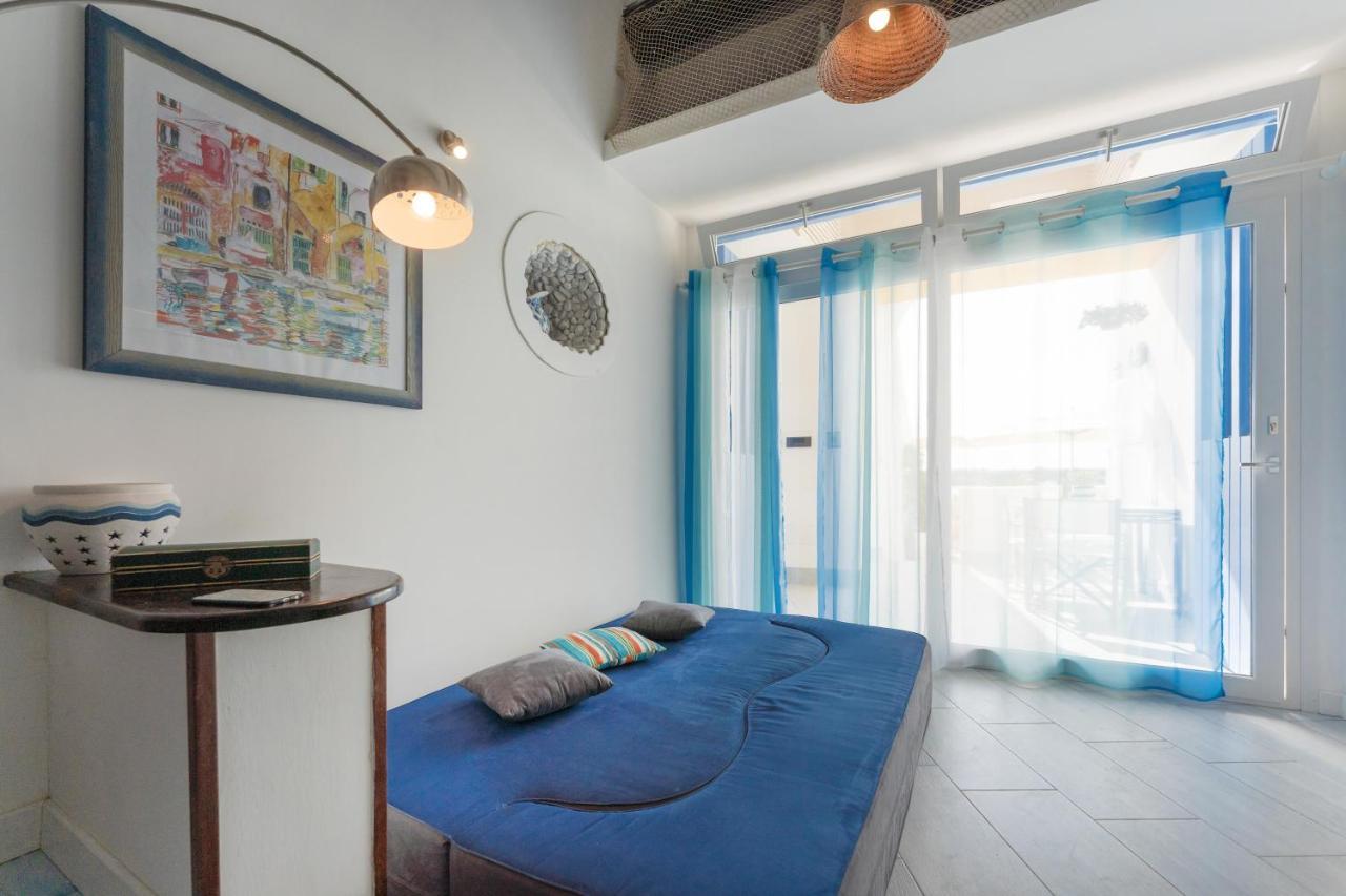 Casa Sottorar - Loft Open Space In Corricella Procida Bagian luar foto